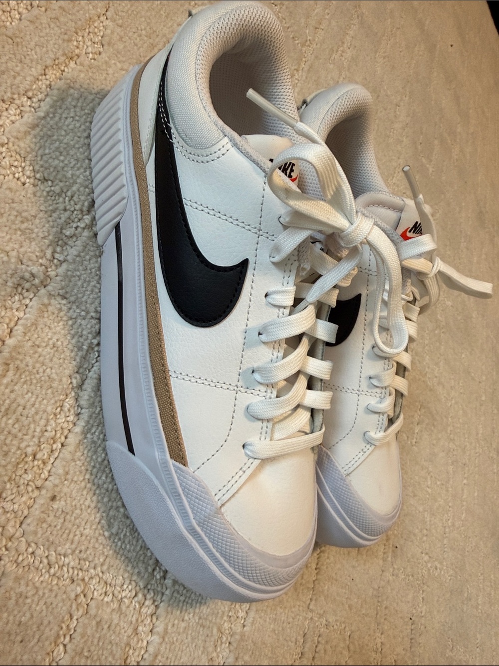 Nike White Leather Sneakers with Black Swoosh and Tan Trim